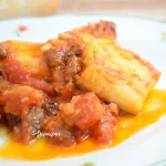 Imagen del Bacalao en salsa de tomate con Piñones y Pasas