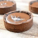 Tartaletas de masa sablé de chocolate con crema de gianduja