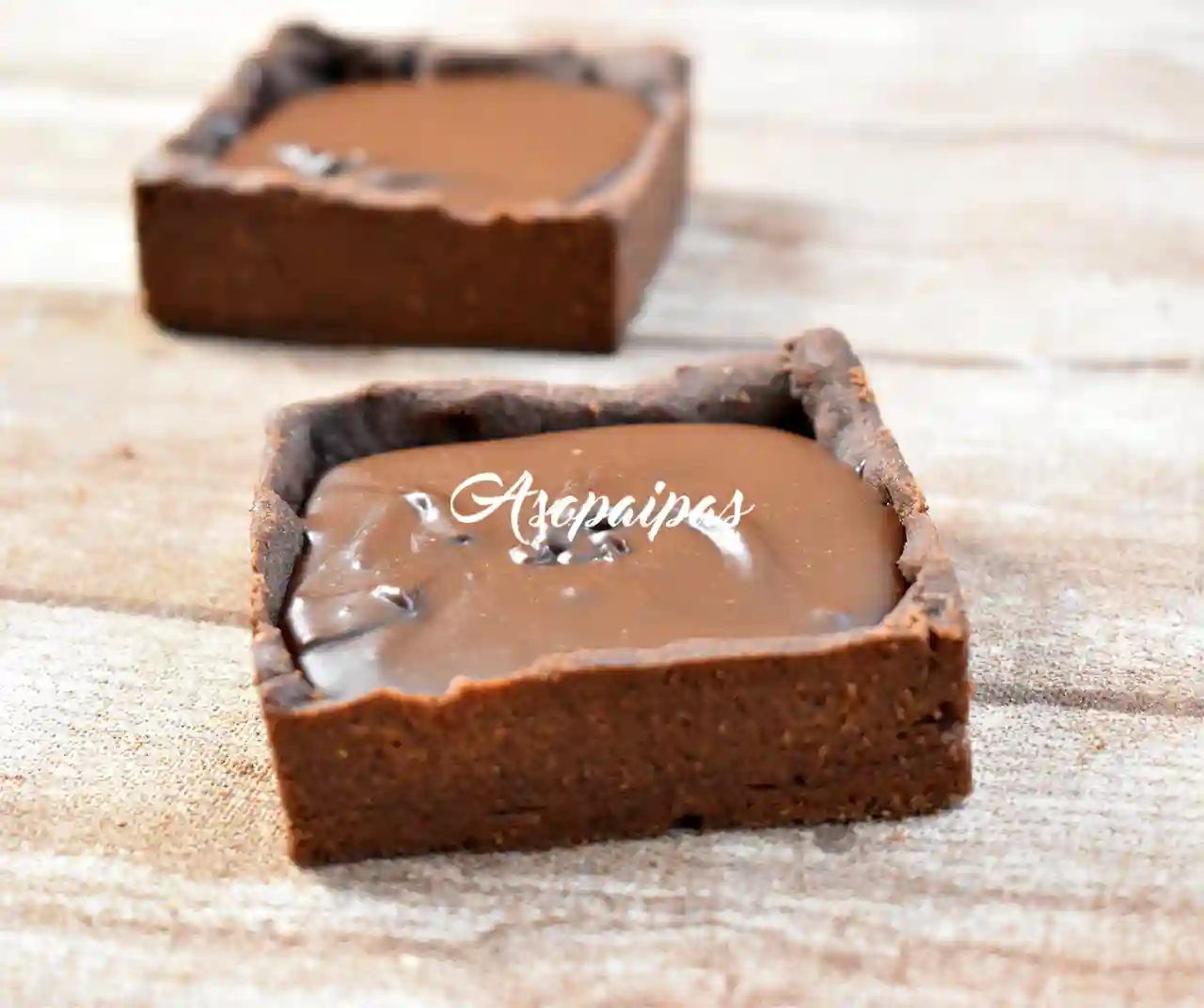 Tartaletas de masa sablé de chocolate con crema de gianduja